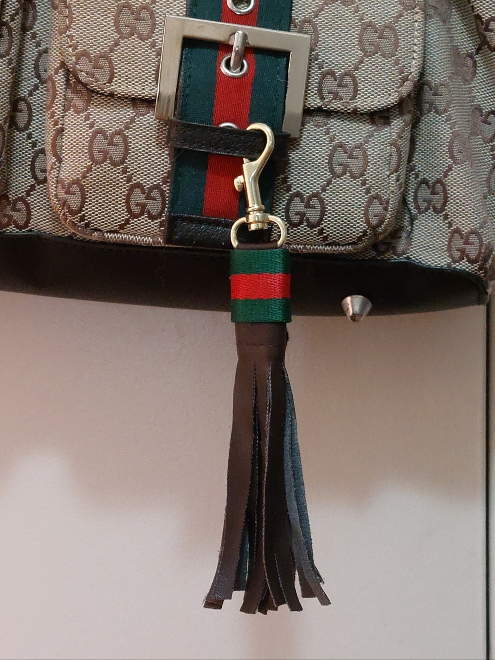Gucci Brown Leather Tassel Bag Charm With Iconic Green/Red Stripes